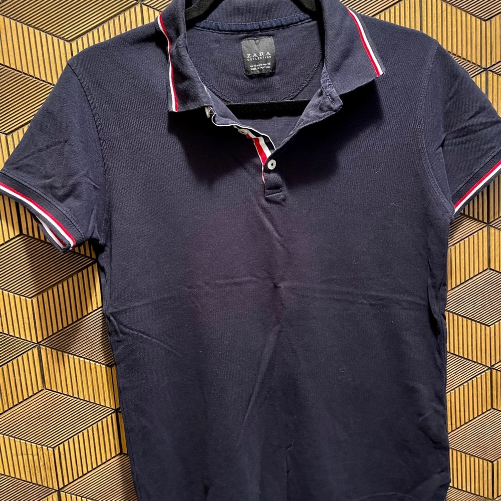 Zara polo. Navy blue, white and red border